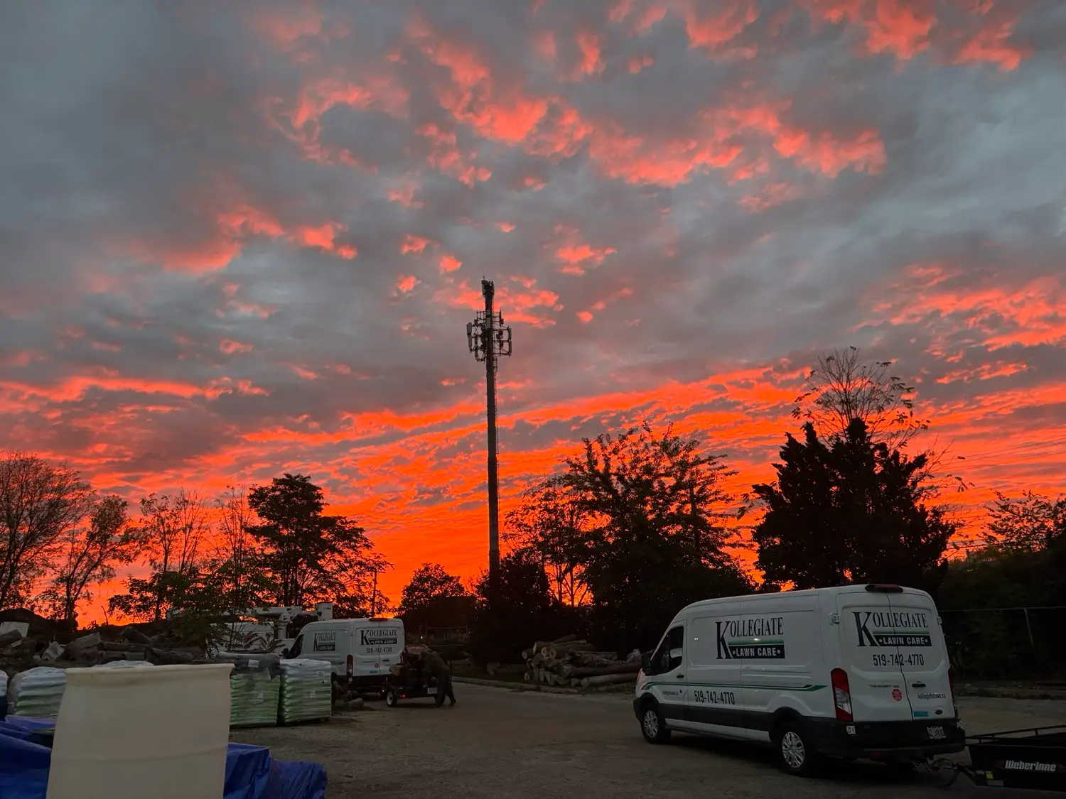 Kollegiate Lawn Care fleet at sunset at the Kitchener yard